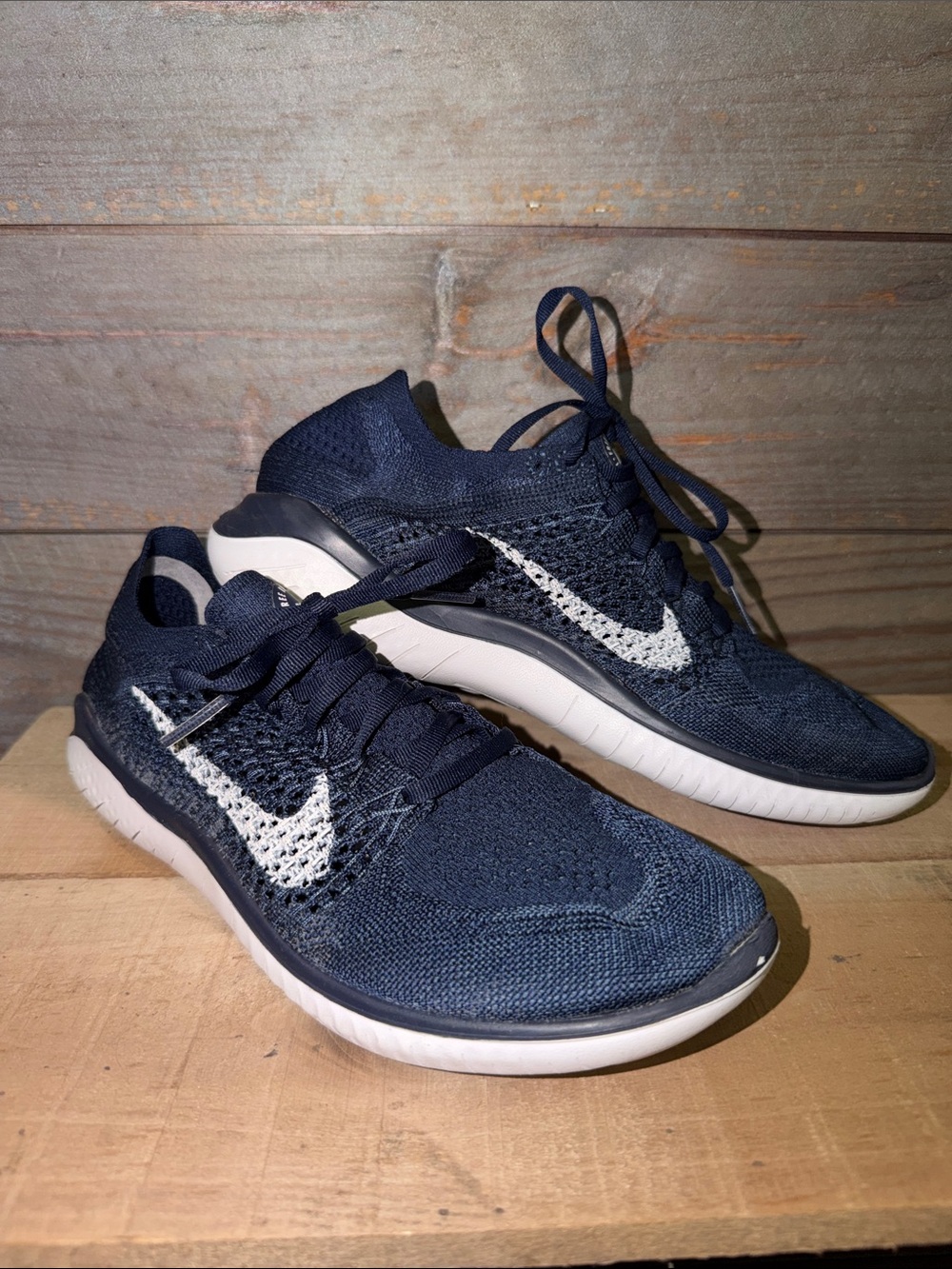 Nike Men's 8 Navy Athletic Running Shoes with White Swoosh